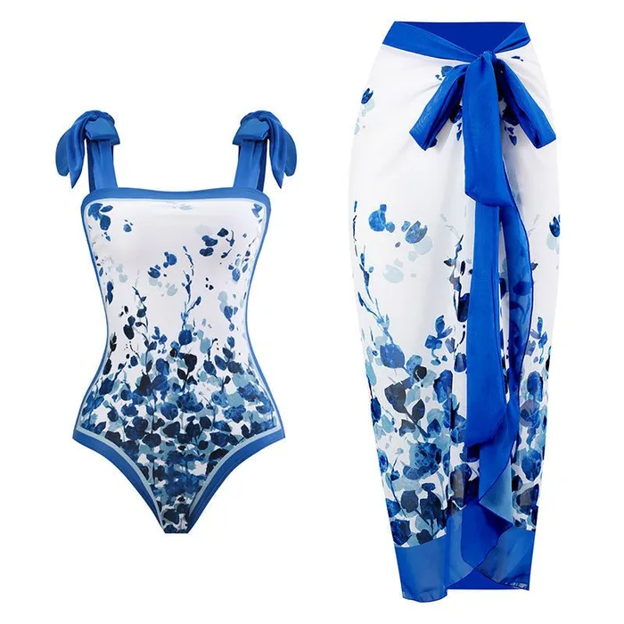 Sinderella Vibrators One Piece Blue Petals Tie Up Swimsuit With Wrap Around Tie Up Sarong Skirt By Sinderella Sinderella Vibrators One Piece Blue Petals Tie Up Swimsuit With Wrap Around Tie Up Sarong Skirt By Sinderella