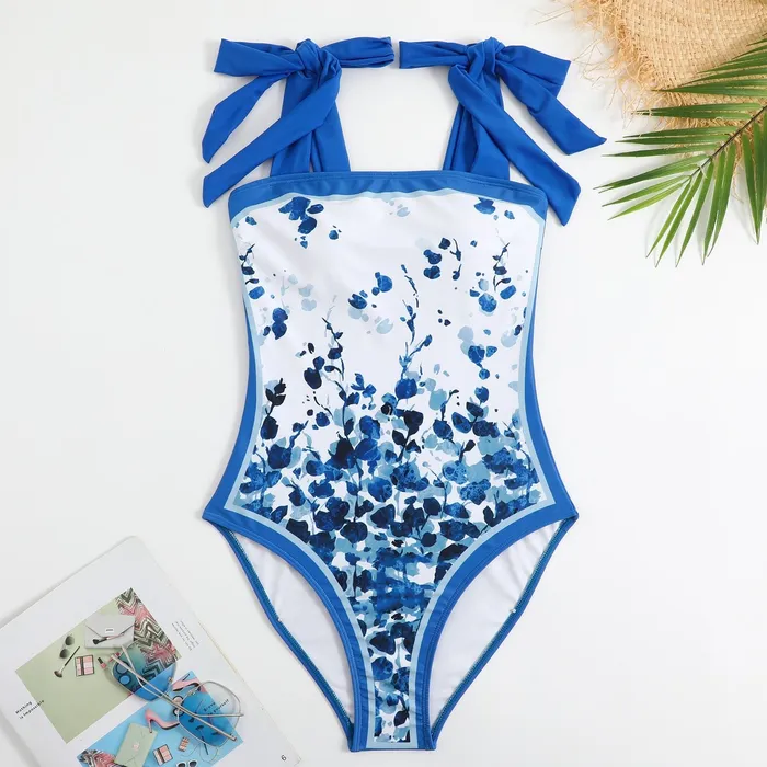 Sinderella Vibrators One Piece Blue Petals Tie Up Swimsuit With Wrap Around Tie Up Sarong Skirt By Sinderella Sinderella Vibrators One Piece Blue Petals Tie Up Swimsuit With Wrap Around Tie Up Sarong Skirt By Sinderella