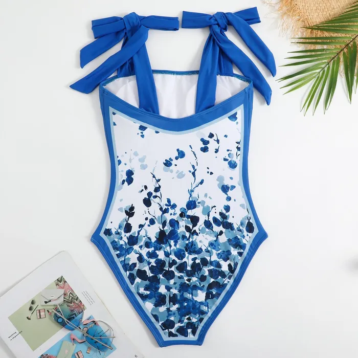 Sinderella Vibrators One Piece Blue Petals Tie Up Swimsuit With Wrap Around Tie Up Sarong Skirt By Sinderella Sinderella Vibrators One Piece Blue Petals Tie Up Swimsuit With Wrap Around Tie Up Sarong Skirt By Sinderella
